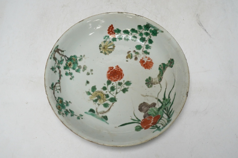 A Chinese famille verte dish, Kangxi period, 21cm. Condition - rim chips, otherwise fair
